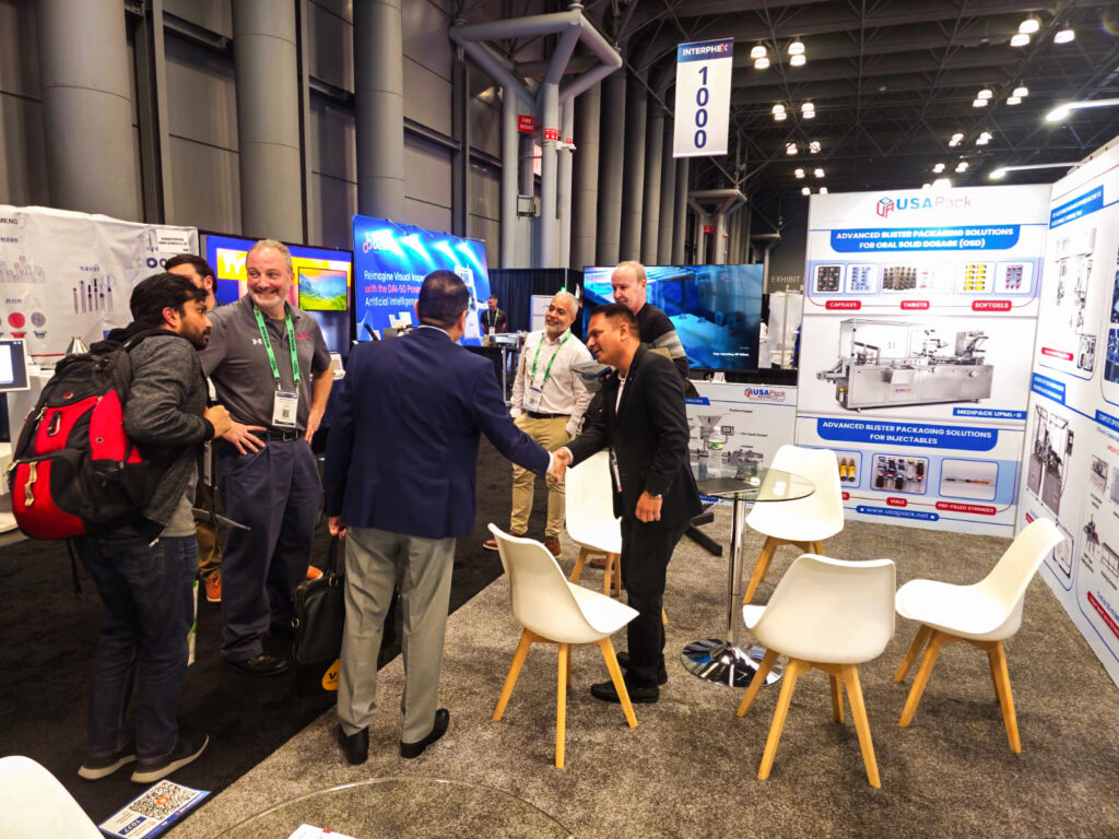 Mr Vishal Upadhyay - Director - Marketing of USA Pack Machines LLC discuss with Visitors